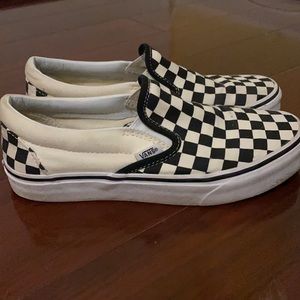 White and black checkered slip on vans!